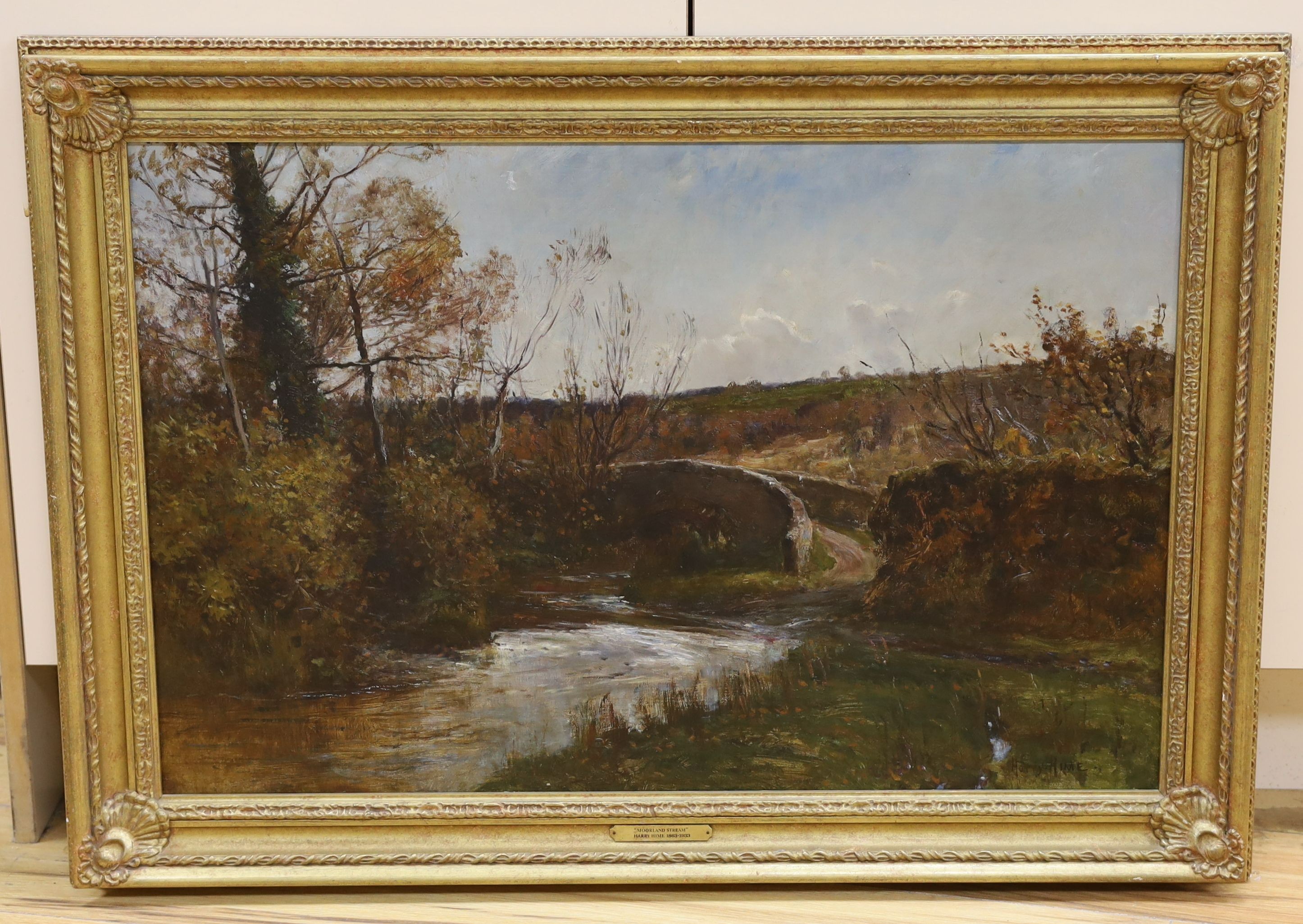 Harry Hime (1863-1933), oil on canvas, River and stone bridge in a landscape, signed, 48 x 74cm